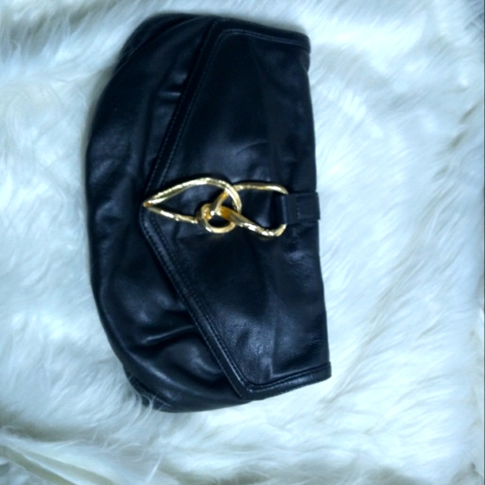 Sondra Roberts black leather clutch/purse bag.